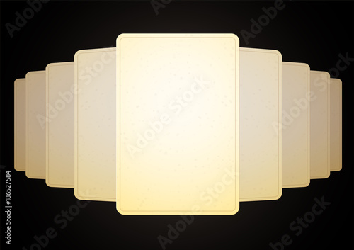 A stack of a deck of several cards spread out on the table with a panorama. The blank, the old paper is yellow