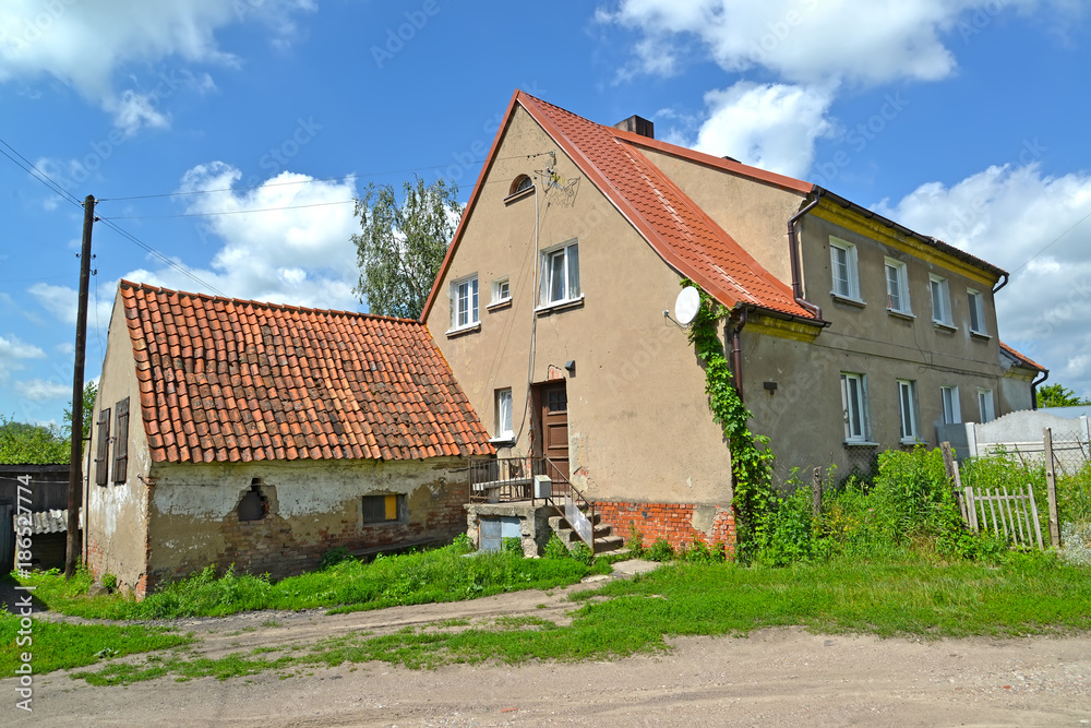  The old apartment house with the attached shed on Karl Marx Street. Gvardeysk, Kaliningrad region