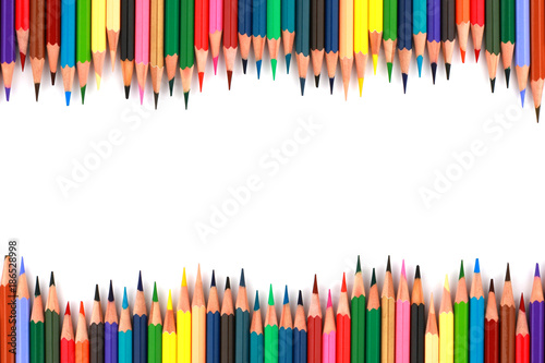 Close up of group color pencils or crayon set isolated on white background. Pencil colors on white background with horizontal white space for text.