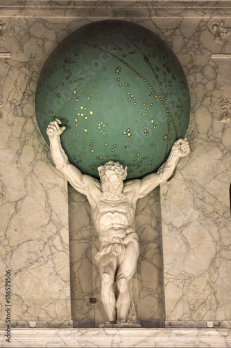 Canvas Print Detail of a marble statue that holds the earth