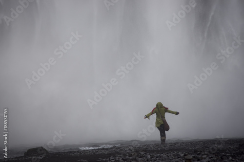 Elf at the waterfall in Iceland - Skógafoss