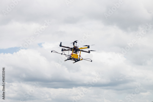 agriculture drone fly on sky and farm field