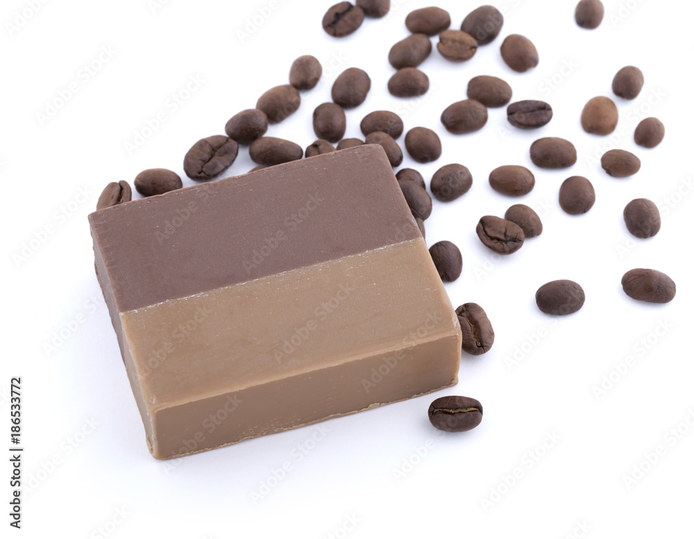 Fototapeta premium Coffee soap with coffee beans isolated on white background