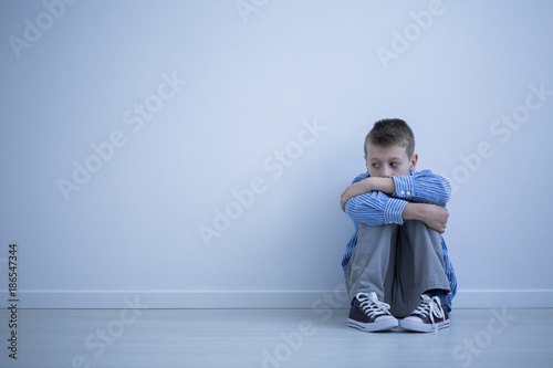 Sad alienated child with autism