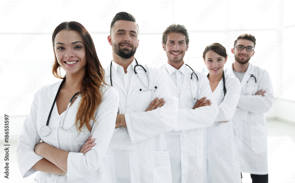 Portrait of medical team standing with arms crossed in hospital Portrait of medical team standing with arms crossed in hospital