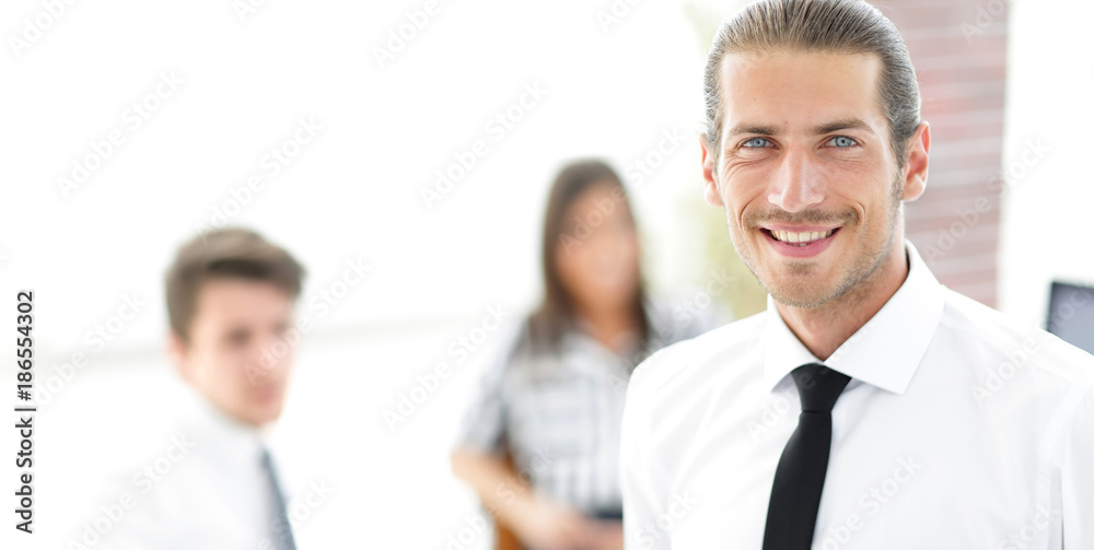 successful young business men on blurred background