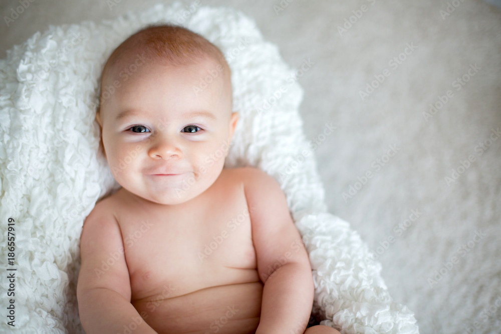 Little baby boy playing at home with soft teddy bear toys Little baby boy playing at home with soft teddy bear toys