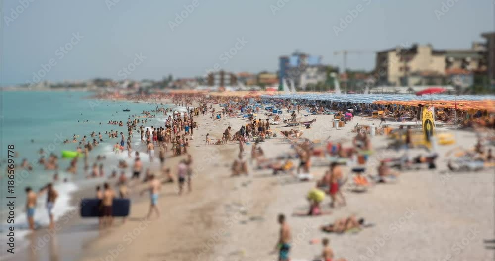 4K Tilt Shift / time-lapse of a busy beach in August, Adriatic sea, Italy 4K Tilt Shift / time-lapse of a busy beach in August, Adriatic sea, Italy
