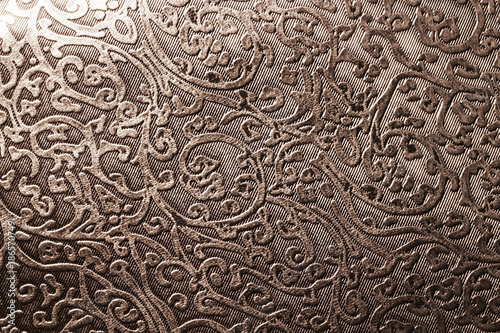 the silver patterns on the fabric