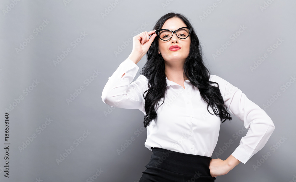 Successful young woman on a solid background Successful young woman on a solid background