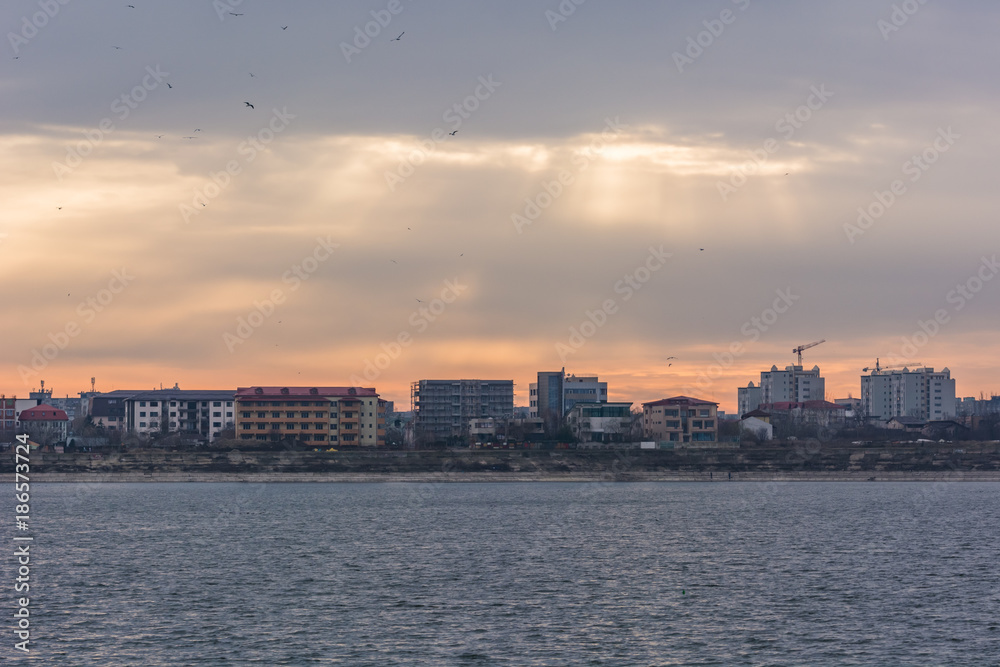 Rays of the Sun Descending Upon the City in Early Winter