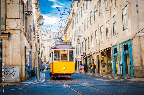 Yellow tram 28 on streets of Lisbon, Portugal photo