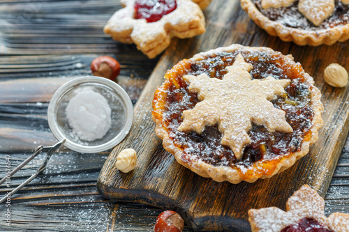 Tartlets with dried fruits, orange jam and nuts. photo