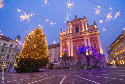 Presern square and Franciscan Church of the Annunciation in Christmas lights in Ljubljana, Slovenia