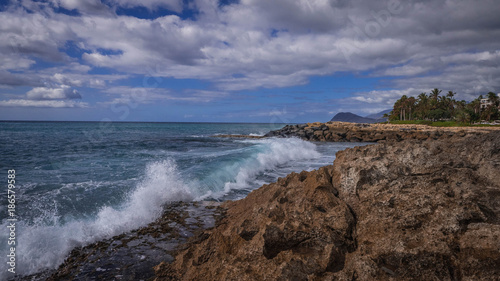 Waves Crashing against rocks on the Hawaiian coastline