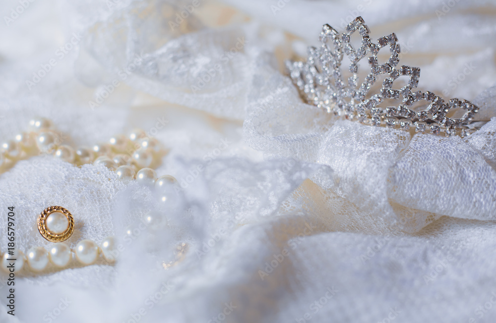 Tiara and white pearls with wedding dress Tiara and white pearls with wedding dress