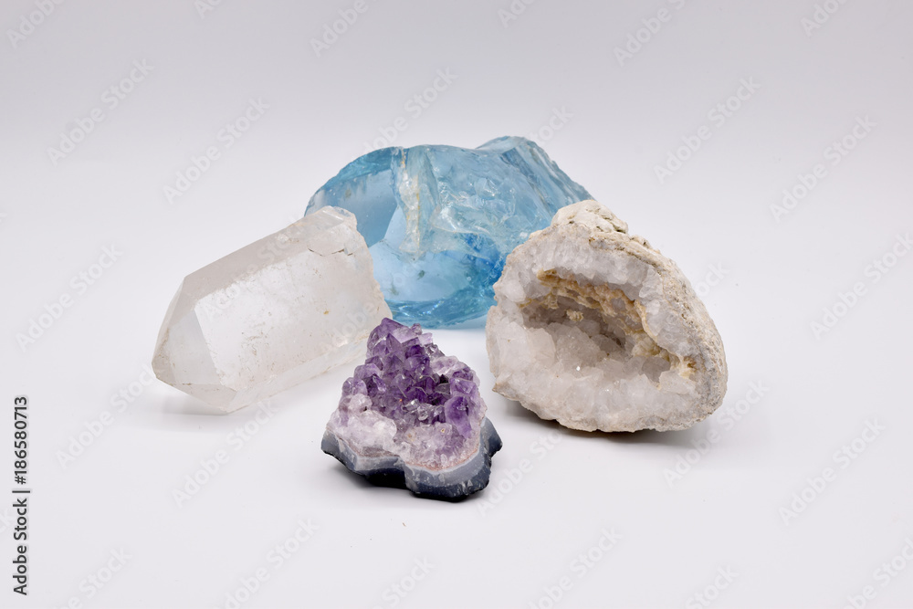 Fossils and Gemstones Arranged on a Seamless White Background