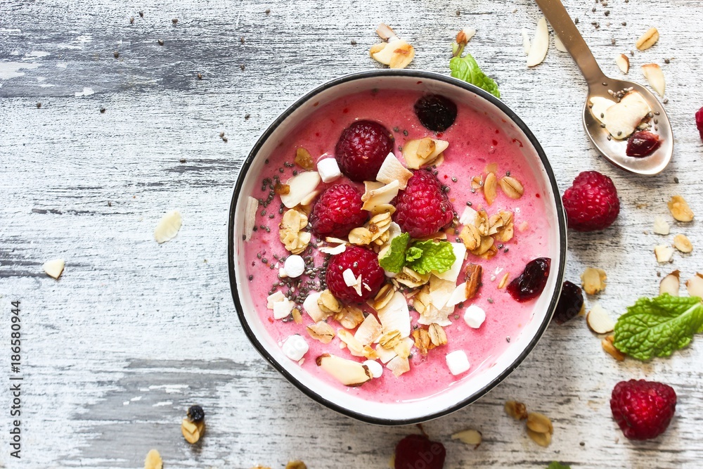 Raspberry Smoothie Bowl / Healthy breakfast concept, selective focus - obrazy, fototapety, plakaty 