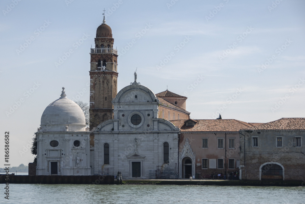 View from the Venice lagoon of the Church of San Michele in Isola on the cemetery island of San Michele, Venice - Italy
