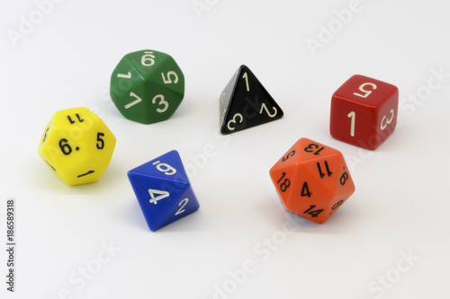 Pile of colorful roleplaying polyhedral dices isolated over the white background frp