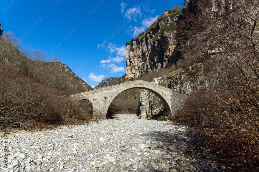 Amazing landscape of Bridge of Missios in Vikos gorge and Pindus Mountains, Zagori, Epirus, Greece Amazing landscape of Bridge of Missios in Vikos gorge and Pindus Mountains, Zagori, Epirus, Greece