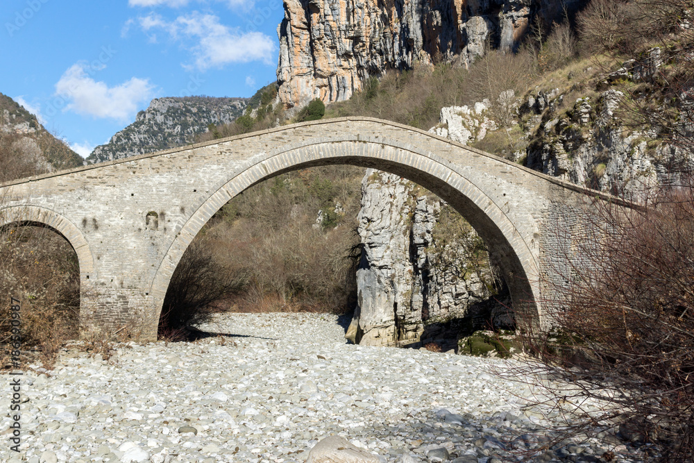 Amazing landscape of Bridge of Missios in Vikos gorge and Pindus Mountains, Zagori, Epirus, Greece Amazing landscape of Bridge of Missios in Vikos gorge and Pindus Mountains, Zagori, Epirus, Greece