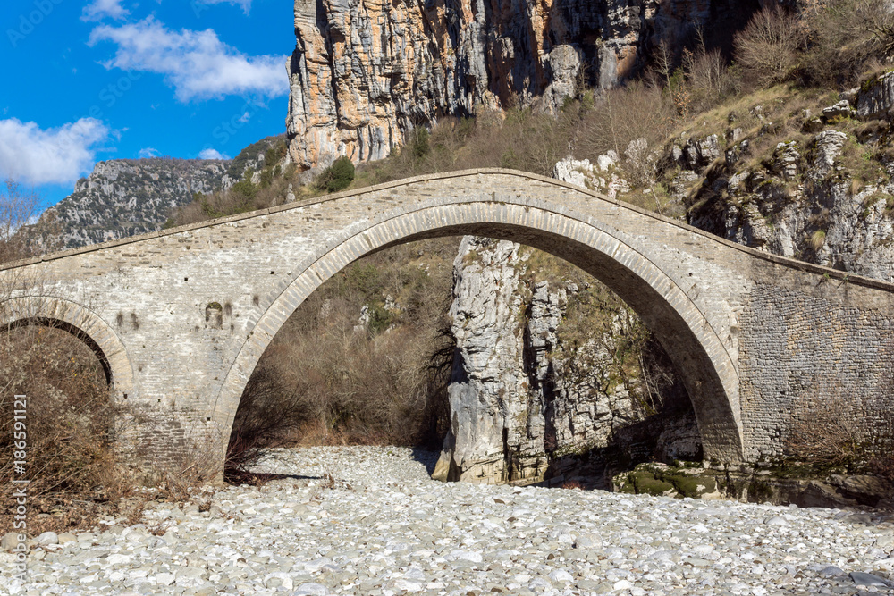Amazing landscape of Bridge of Missios in Vikos gorge and Pindus Mountains, Zagori, Epirus, Greece Amazing landscape of Bridge of Missios in Vikos gorge and Pindus Mountains, Zagori, Epirus, Greece