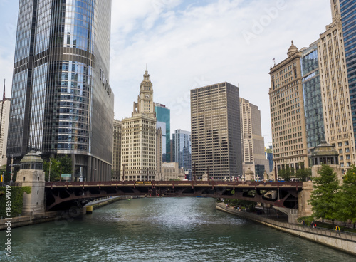 The Wabash Avenue Bridge with traffic and Lake Michigan River surrounded by financial buildings, Chicago, IL, USA on the 3th of August, 2017