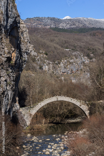 Amazing landscape of Bridge of Kontodimos or Lazaridis in Vikos gorge and Pindus Mountains, Zagori, Epirus, Greece