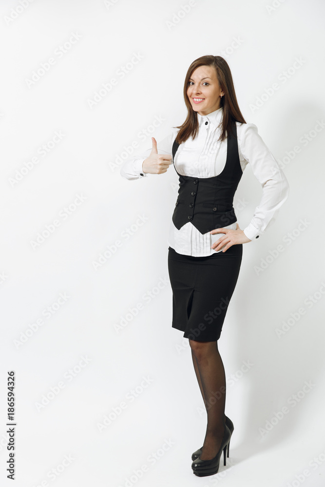 Full length of beautiful caucasian young smiling brown-hair business woman in black suit, white shirt showing thumb up isolated on white background. Manager or worker. Copy space for advertisement. Full length of beautiful caucasian young smiling brown-hair business woman in black suit, white shirt showing thumb up isolated on white background. Manager or worker. Copy space for advertisement.