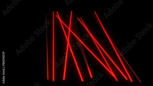 Bright red laser beams moving in black studio. Dance club lights.