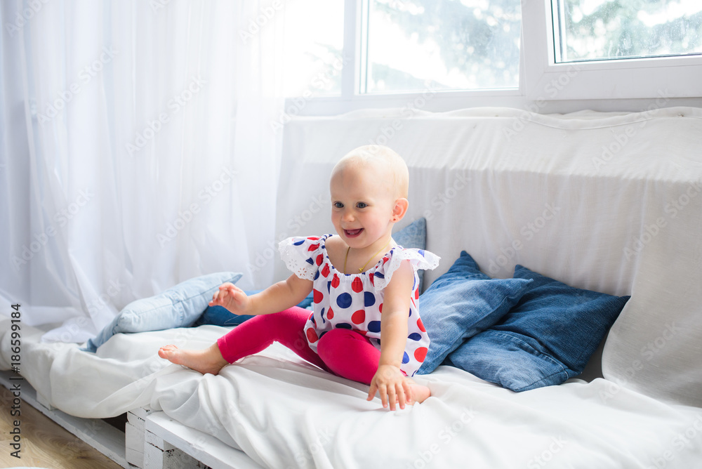 Portrait of a pretty smilling little baby girl at home Portrait of a pretty smilling little baby girl at home