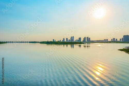 River and city © aphotostory