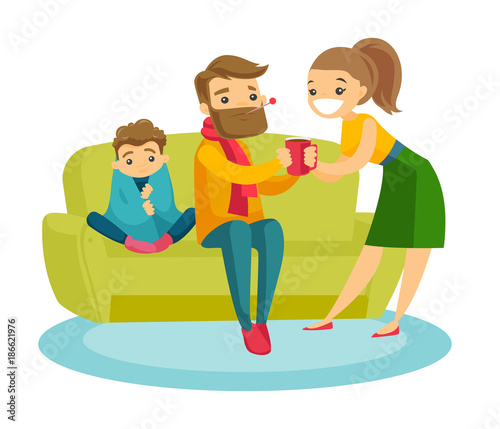 Young caucasian white sick father with thermometer in mouth and his ill son covered with a blanket sitting on the couch while careful mother standing nearby with a mug. Vector cartoon illustration.