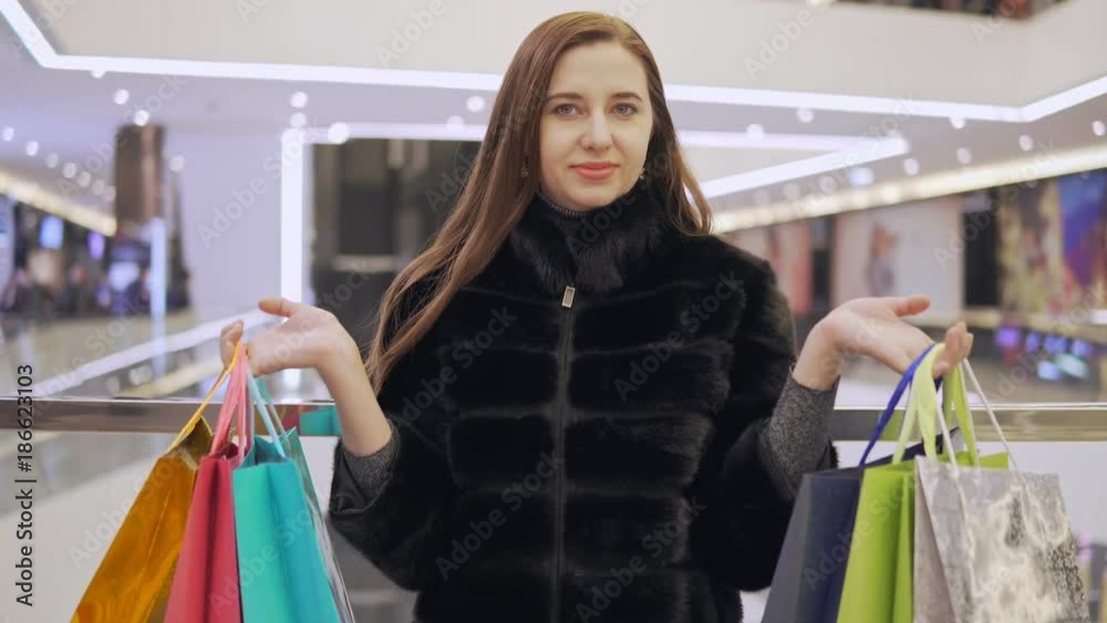 Girl with colored bags. Girl with colored bags.