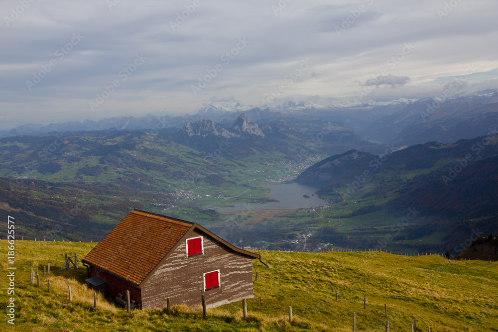 Panoramic landscape view of Mount Rigi with small house on the top of Rigi Kulm Switzerland Panoramic landscape view of Mount Rigi with small house on the top of Rigi Kulm Switzerland