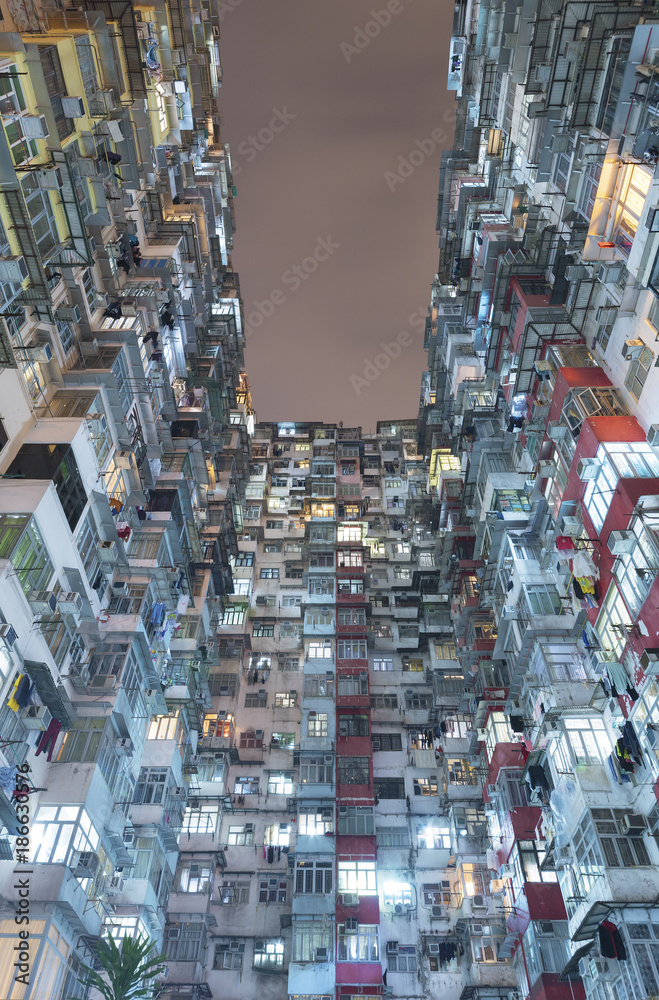 Old residential buildings in Hong Kong city at night Old residential buildings in Hong Kong city at night