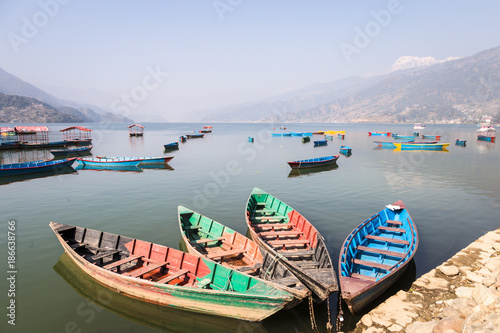 rowbaots in Phewa lake in Pokhara in Nepal photo