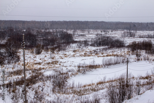 snow-covered fields on a frosty winter day © Dmitrii