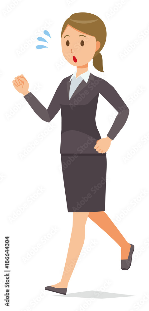 A business woman in a suit is running