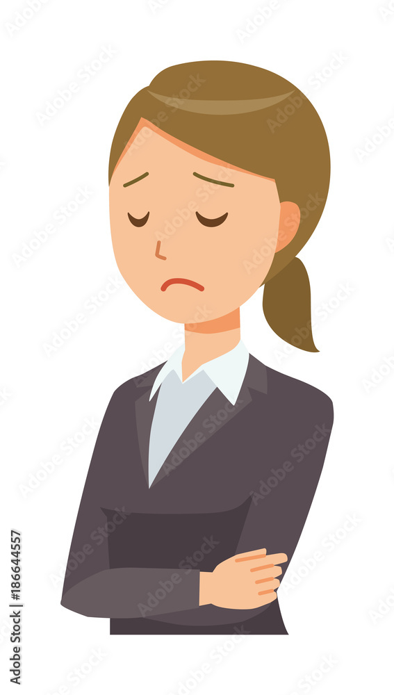 A business woman in a suit is depressed