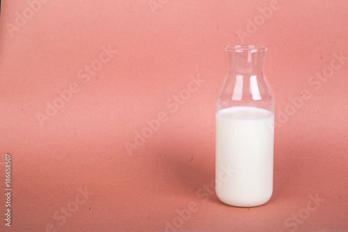 Single Milk in Bottle on Light Background