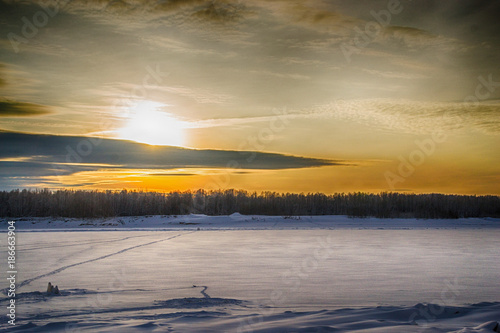 sunset on the river in winter © Алексей Филатов