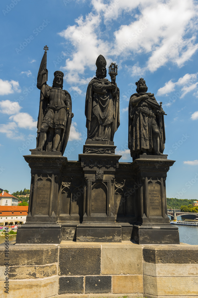 PRAGUE, CZECH REPUBLIC - JUNE 25,2016: Statues of Saints Norbert, Wenceslaus and Sigismund on the Charles Bridge at Prague, Czech Republic..