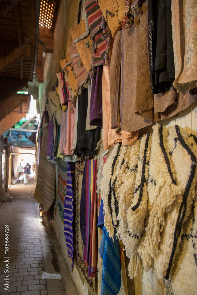 street life morocco marrakech medina leather products in the streets, jackets, bags, slippers
