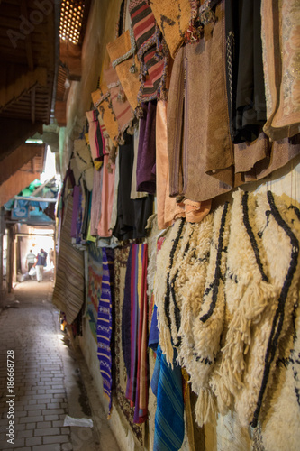 street life morocco marrakech medina leather products in the streets, jackets, bags, slippers © henktennapel