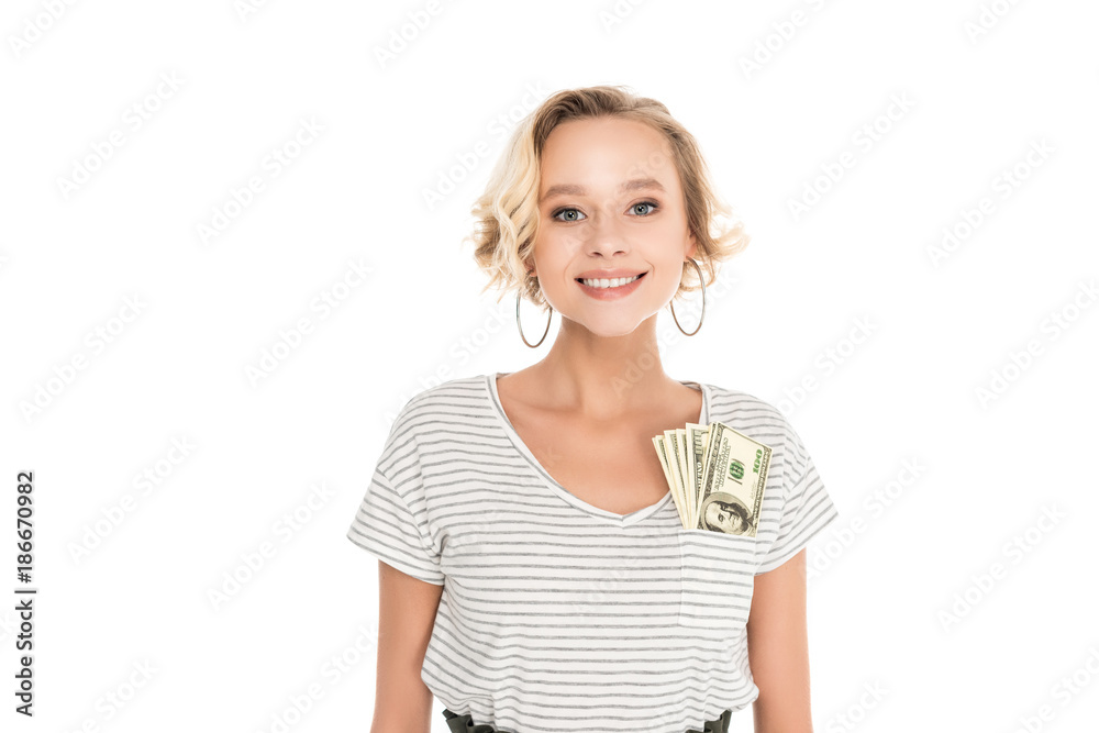 beautiful young woman with dollar banknotes in pocket of t-shirt smiling at camera isolated on white beautiful young woman with dollar banknotes in pocket of t-shirt smiling at camera isolated on white
