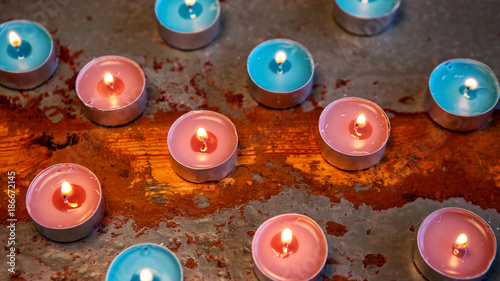 candles on a rustic wooden table