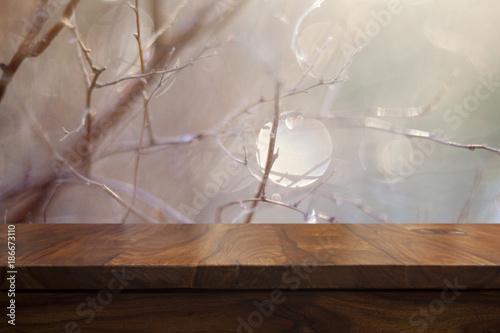 Empty top wooden table and bokeh background