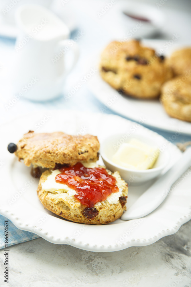 Fresh homemade scones with butter and jam Fresh homemade scones with butter and jam